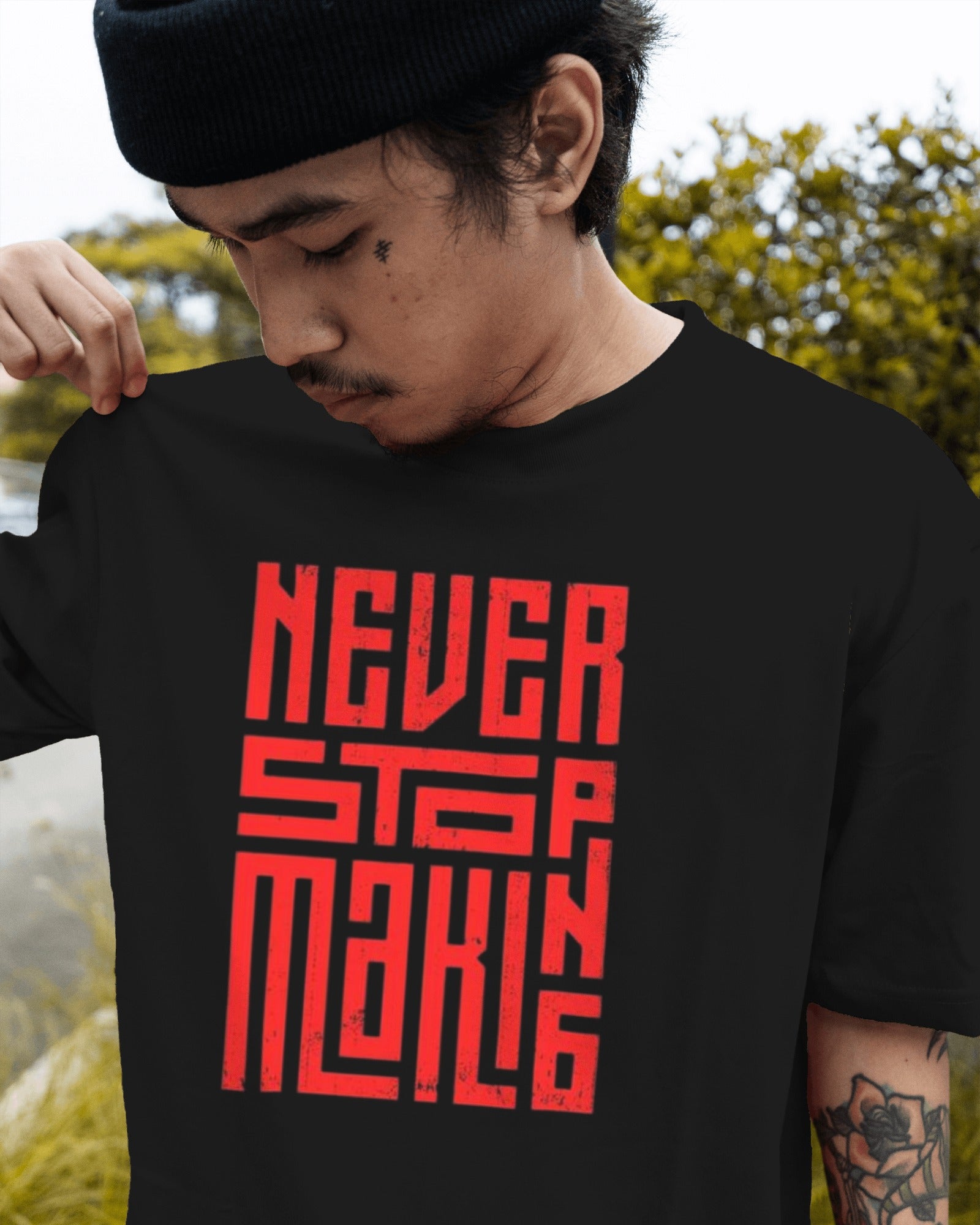 Never Stop - Oversized Black Front Tee